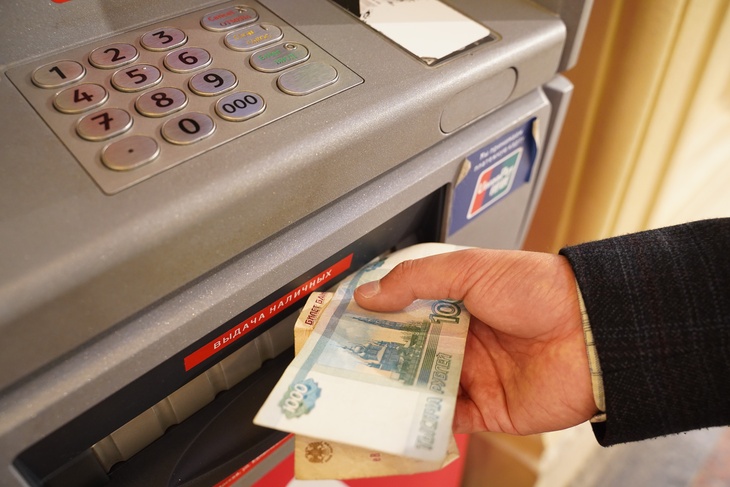 Получение денег в банкомате